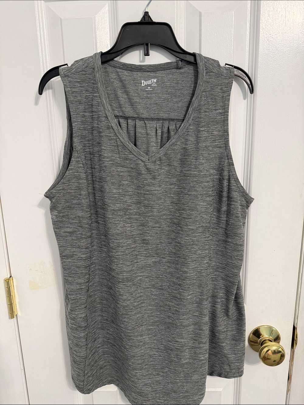Duluth V-neck tank flowing material